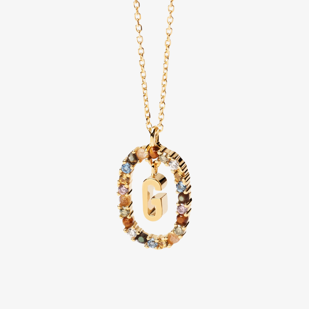 Collier pendentif initiale doré avec pierre colorée
