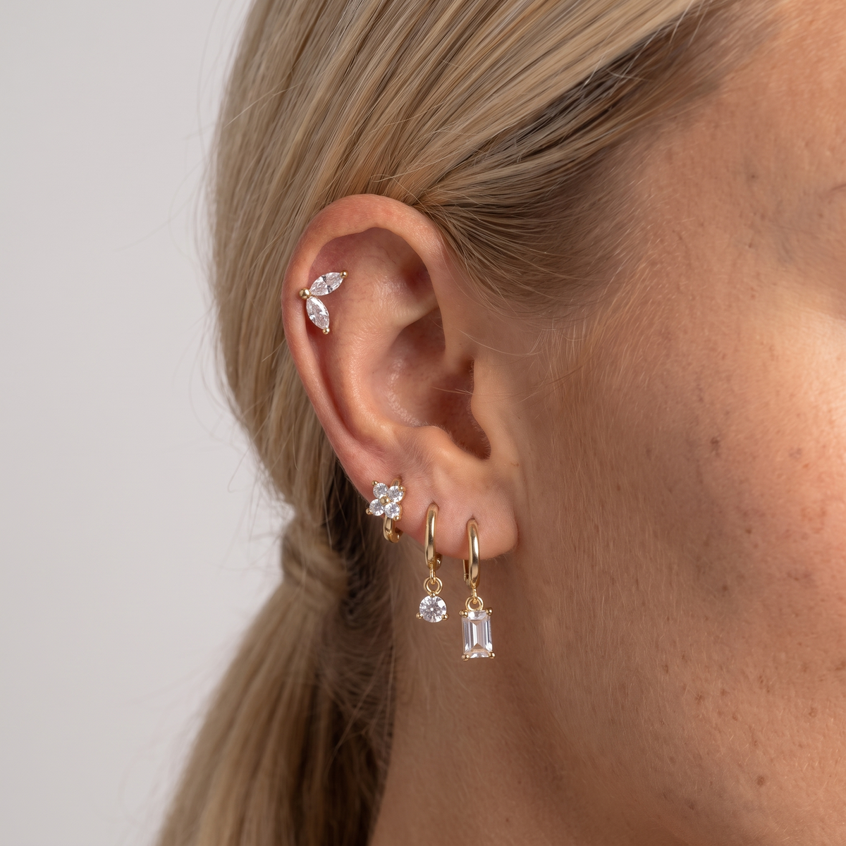 CZ Huggie Stud Earring Set — Silver, worn