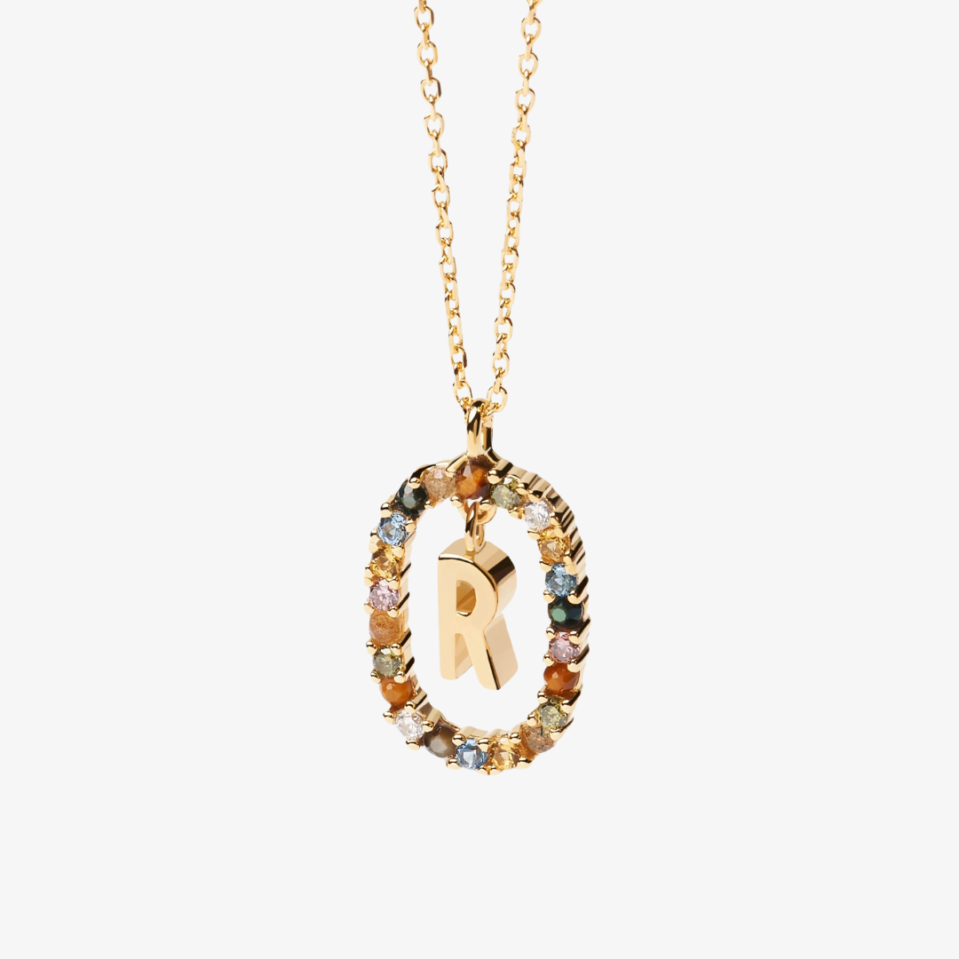 Collier pendentif initiale doré avec pierre colorée