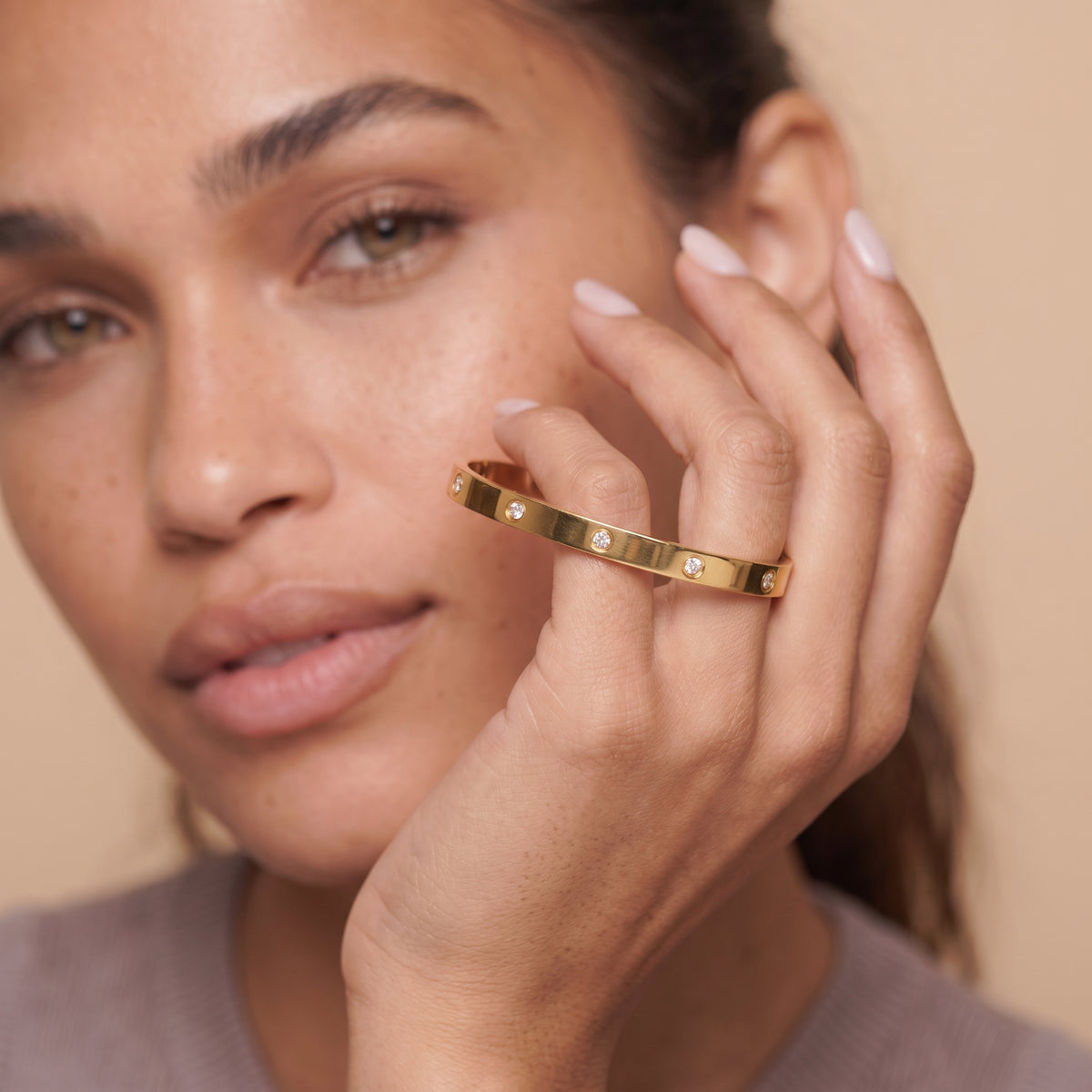 Bezel Set CZ Bangle Bracelet — Gold, worn