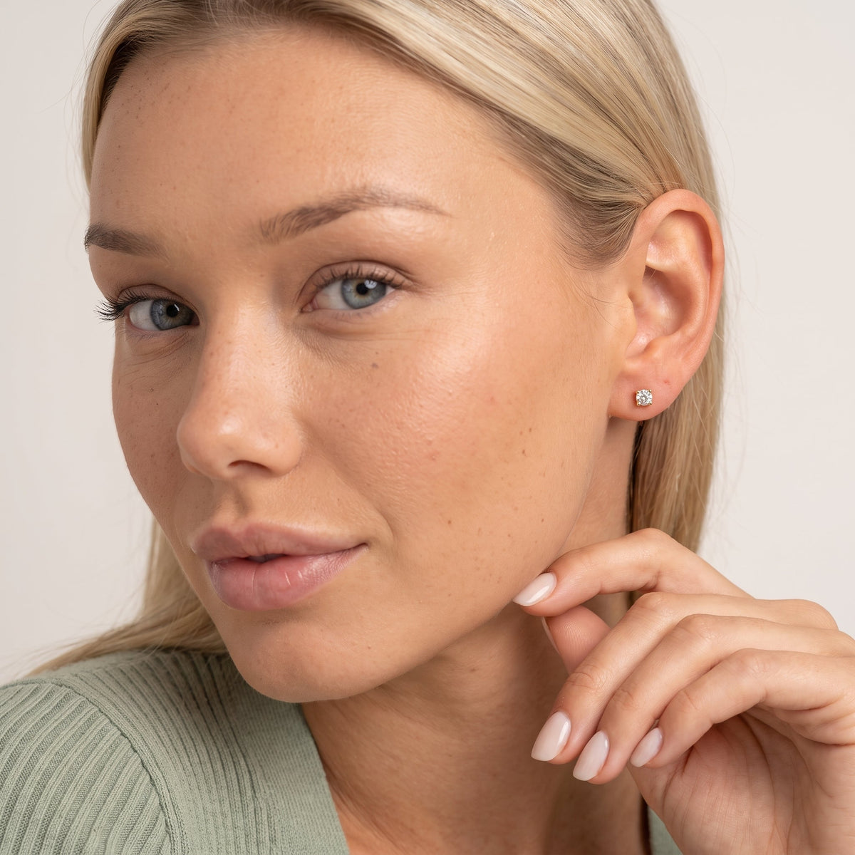 CZ Screw Flat Back Stud Earrings — Gold, worn