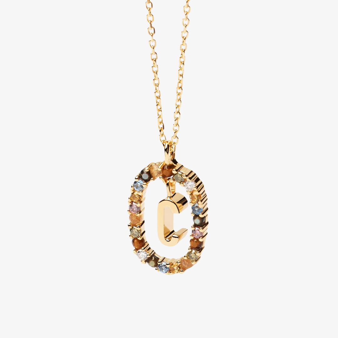 Collier pendentif initiale doré avec pierre colorée