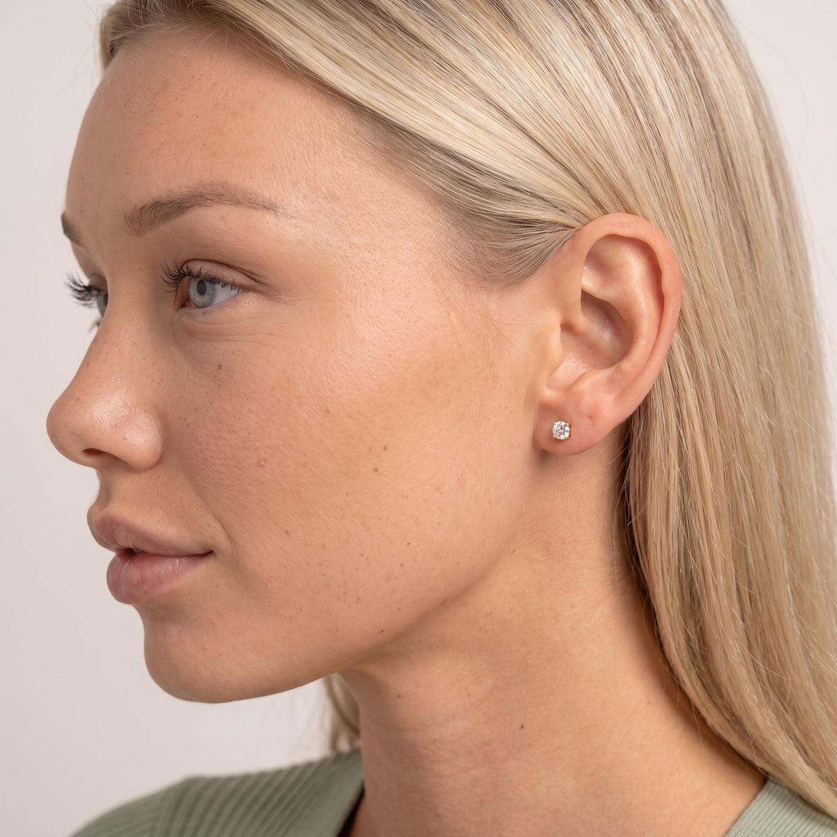 CZ Screw Flat Back Stud Earrings — Gold, worn
