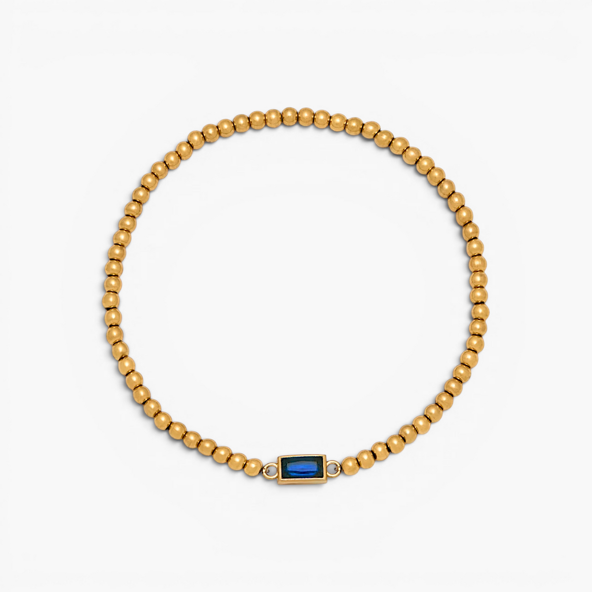 Bracelet doré à perles et pierre de naissance