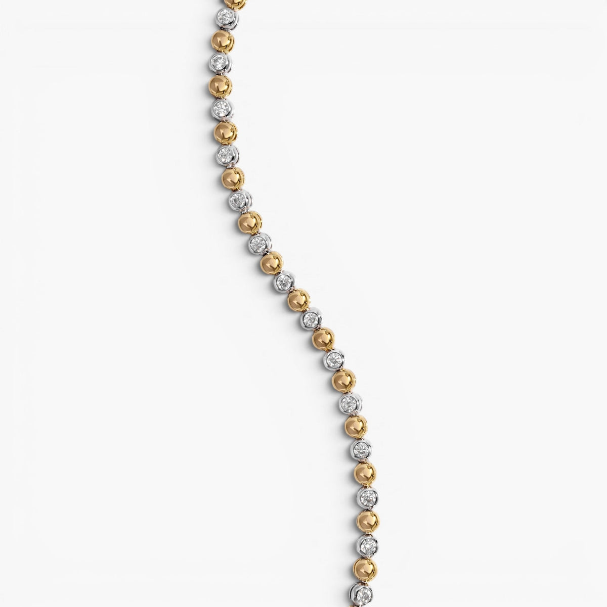 Bracelet tennis bicolore à perles et sertis clos