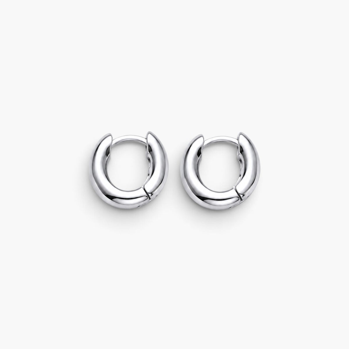 Evervanta dainty silver huggie hoop earrings with a polished finish for everyday wear.