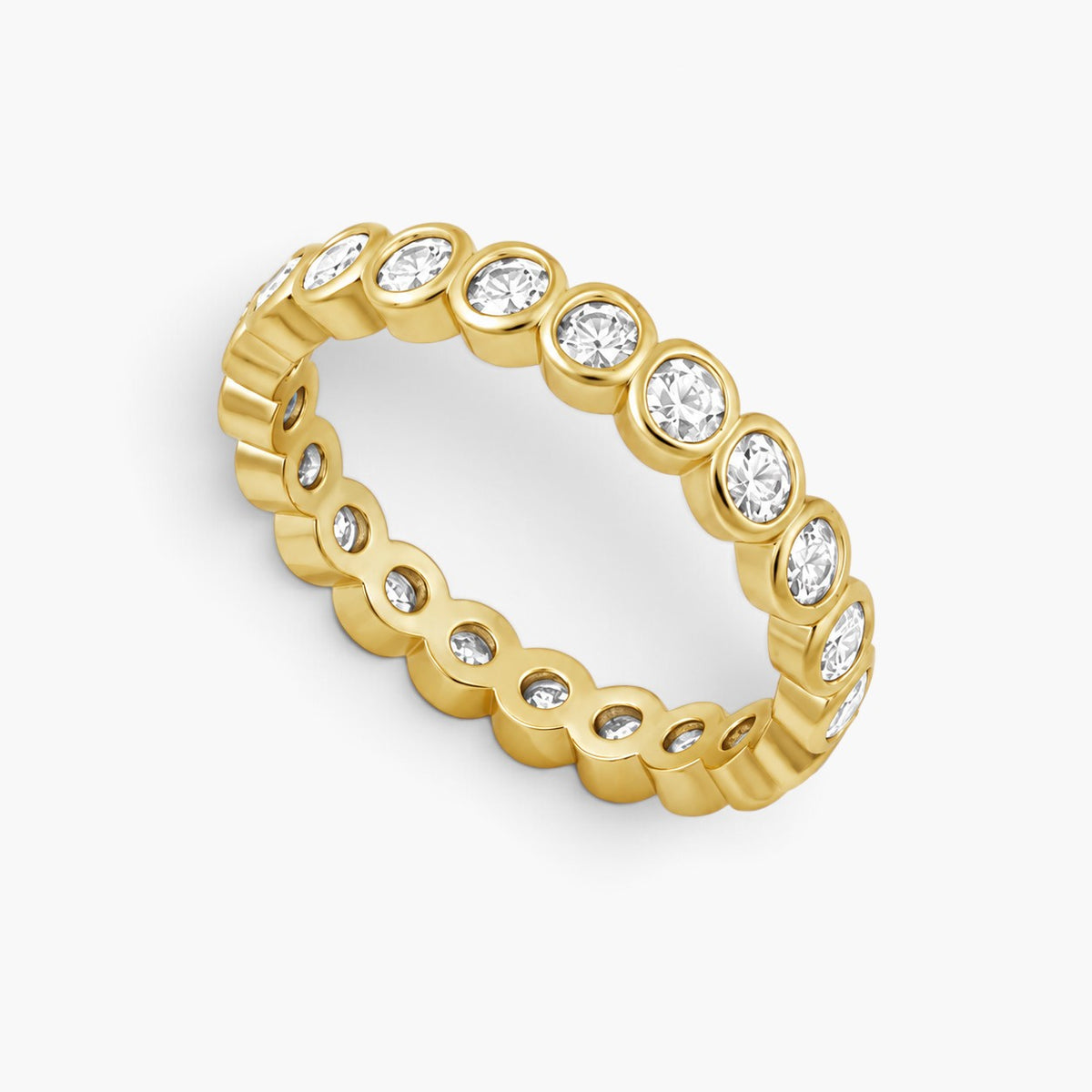 Evervanta gold plated brass stackable ring featuring a continuous row of sparkling cubic zirconia stones.