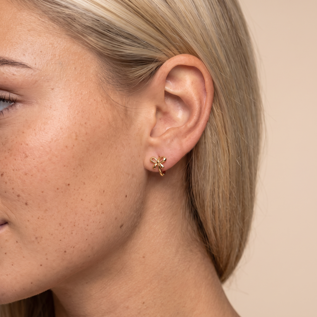 Bow Mini Hoop Earrings - worn