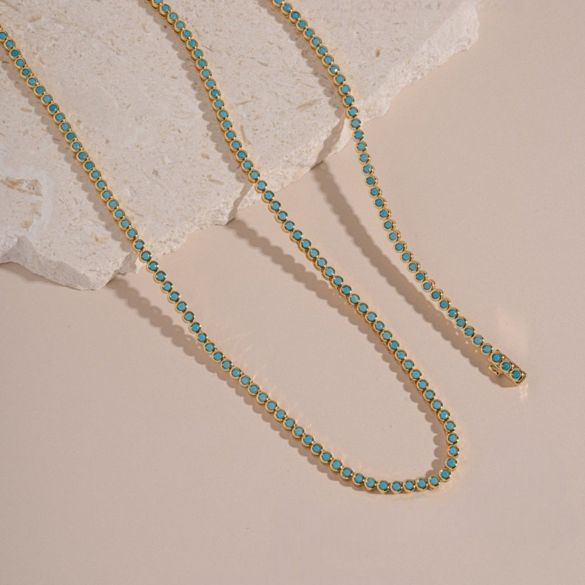 Bracelet tennis classique turquoise serti clos