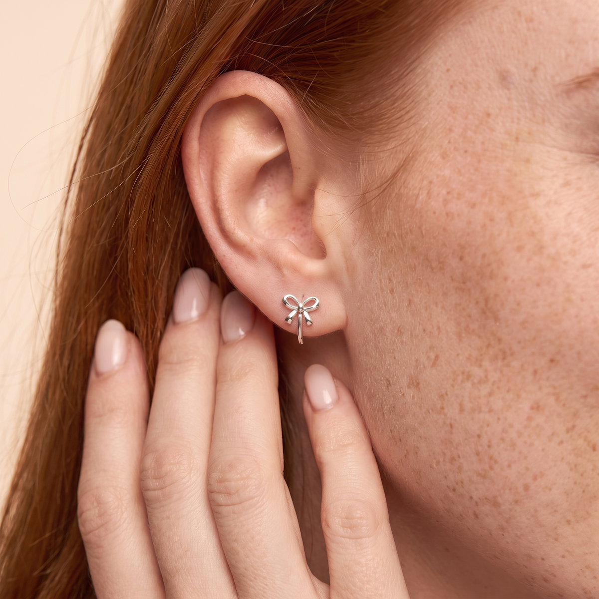 Bow Mini Hoop Earrings - close-up