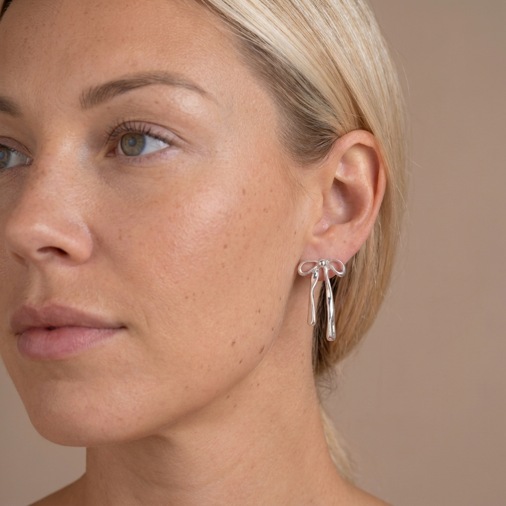 Minimalist Bow Stud Earrings - Silver - close-up